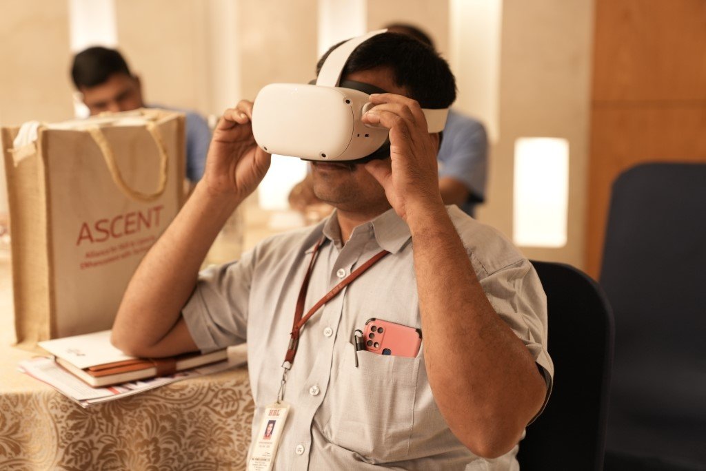 One of the attendees is seen trying out the VR feature